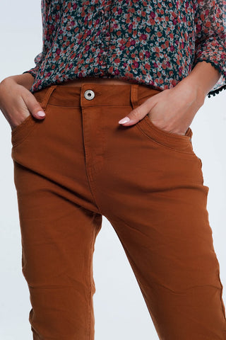 Jeans skinny com corte baixo na cor laranja
