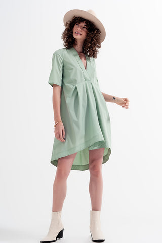 Vestido alto baixo com cintura império em verde