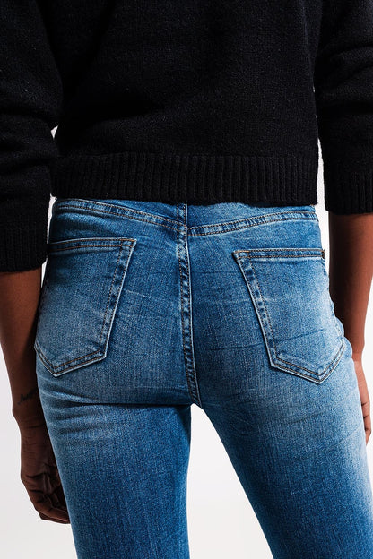 Calça jeans skinny elástica de cintura alta em azul médio