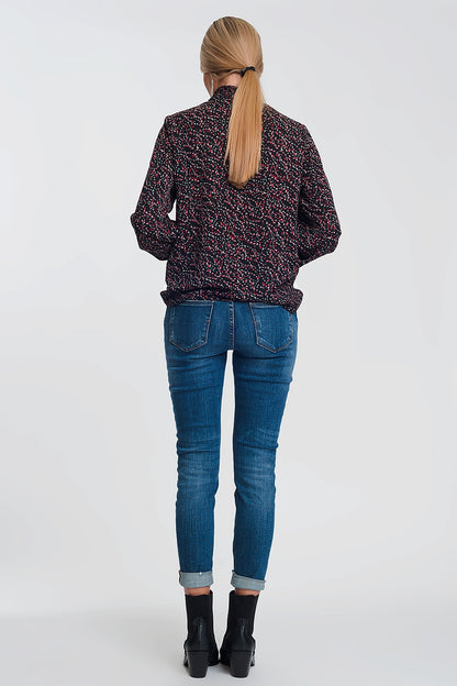 Calça jeans skinny de cintura alta em azul escuro com detalhes rasgados