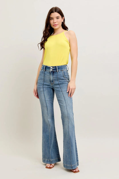 Woman wearing Judy Blue front seam denim pants with high waist and flare leg style