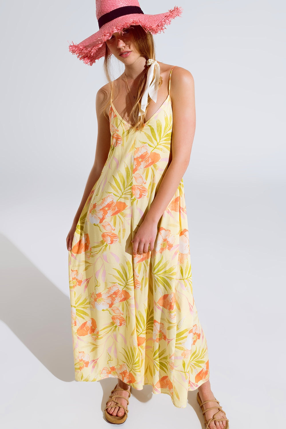 macacão maxi amarelo com estampado tropical