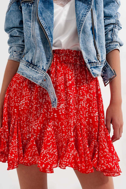Mini-saia vermelha com estampas florais e rufos