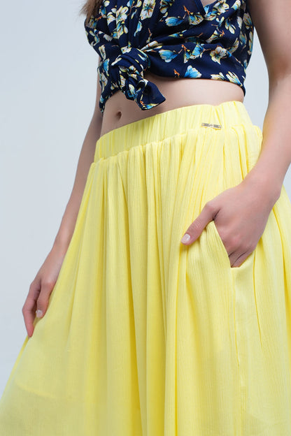 Saia maxi amarela com bolsos