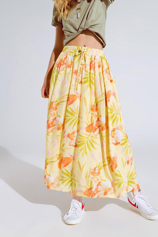 Q2 saia maxi amarela com estampado tropical