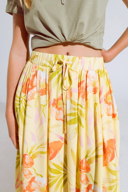saia maxi amarela com estampa tropical
