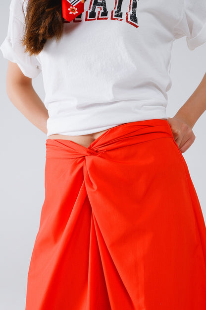 Saia maxi de popelina cor de laranja com detalhes de nó na cintura