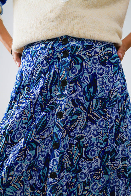 Saia midi plissada em azul com estampado abstrato e carcela de botões