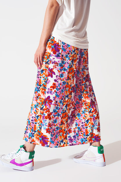 Saia plissada midi com estampa floral
