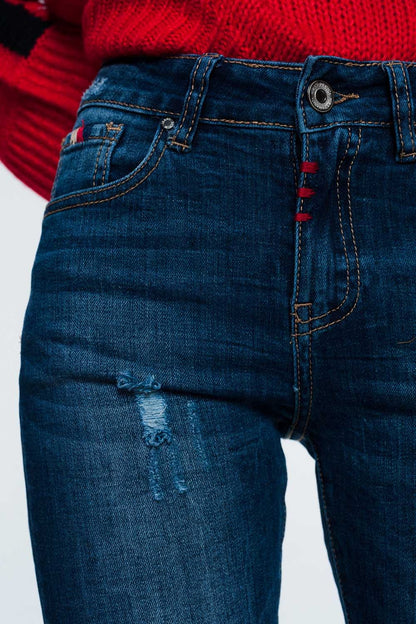 jeans skinny com detalhe de desgaste