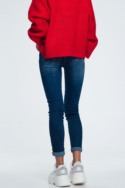 jeans skinny com detalhe de desgaste