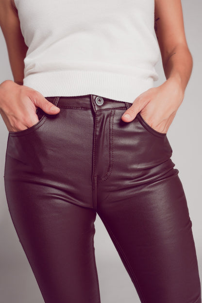 Stretch faux leather flare pants in brown