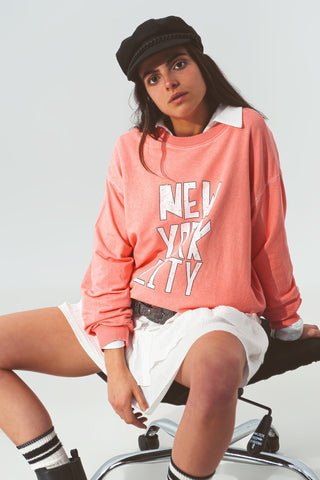 Sweatshirt with New York City text in Coral