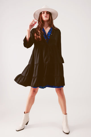 Vestido curto preto com blusa em camadas