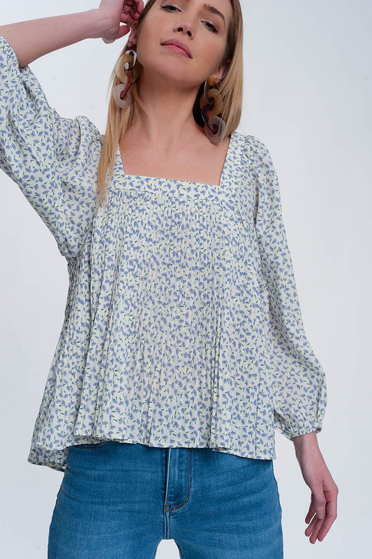 Q2 Top floral azul com decote quadrado e mangas insufláveis