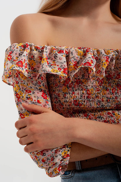 Top tirado do ombro com rufos em estampado floral de coral