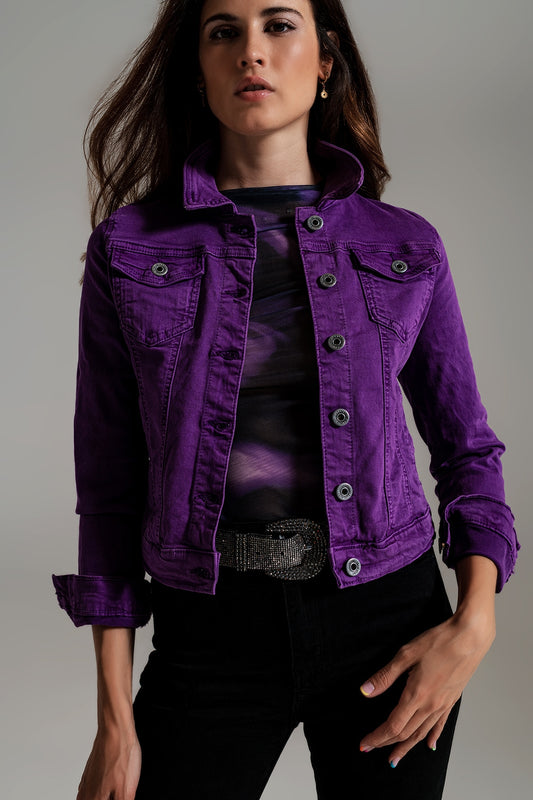 Fitted purple jean jacket by Q2 worn by model with front button closure and classic collar