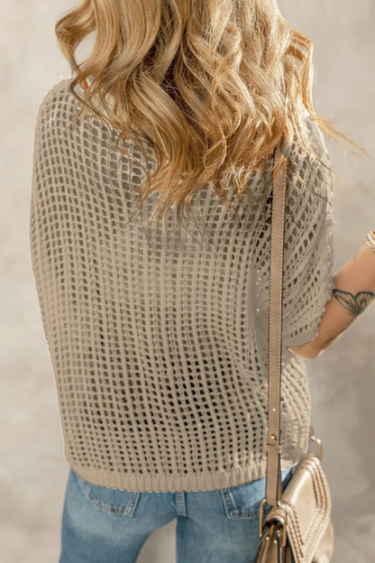 Knit beach cover up camisola in beige worn over casual outfit with shoulder bag