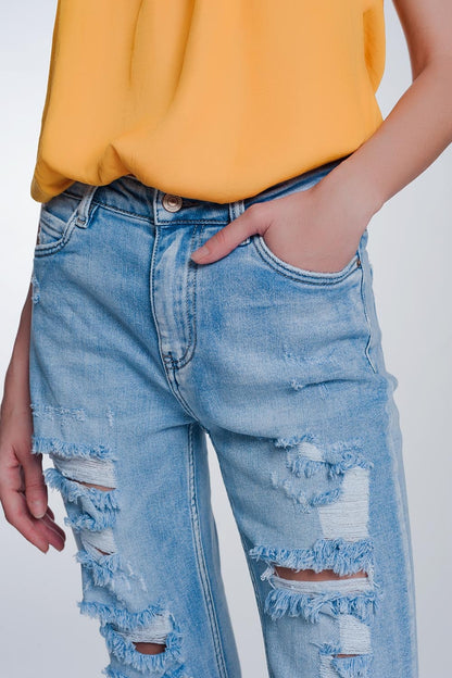 jeans cropped de perna larga com bainha crua na cor azul